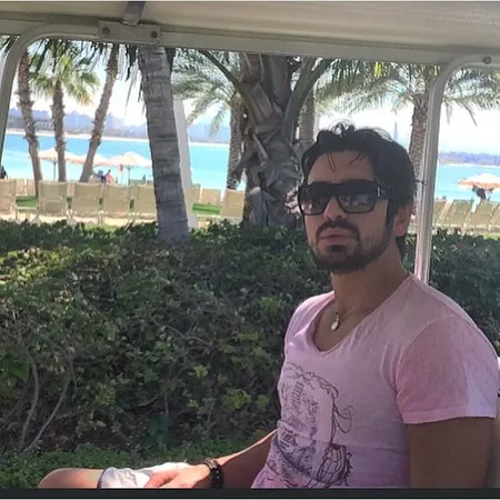 دانلود آهنگ عشق تو از امیر عباس گلاب